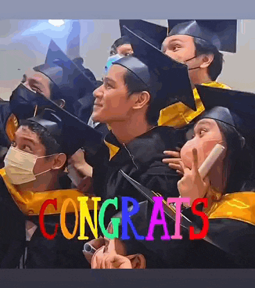 a group of graduates are posing for a picture with the words congrats in the background
