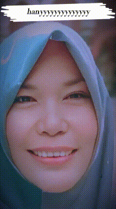 a close up of a woman wearing a hijab and smiling with the word hany written on the bottom
