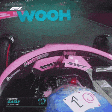 a pink race car with the word wooh on the top