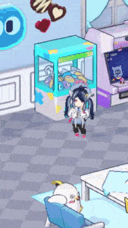 a girl is standing in front of a claw machine in a room