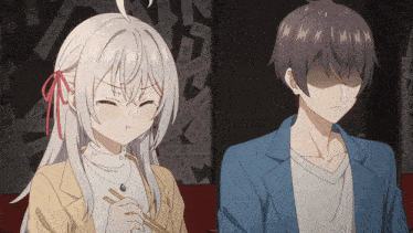 a boy and a girl are sitting next to each other and the girl has chopsticks in her hand