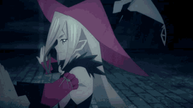 a girl in a witch costume with a pink hat and gloves