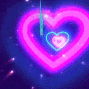 a purple heart with a blue heart in the middle of it