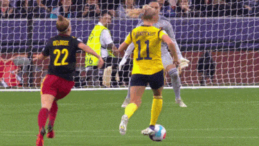 a female soccer player with the number 22 on her back