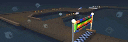 a blurred image of a race track with a checkered flag in the middle