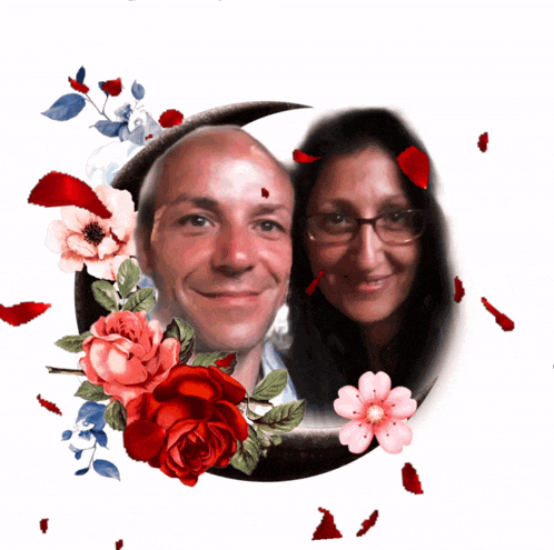 a man and woman are surrounded by flowers and petals