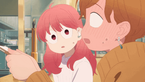 a girl with pink hair is being kissed on the cheek