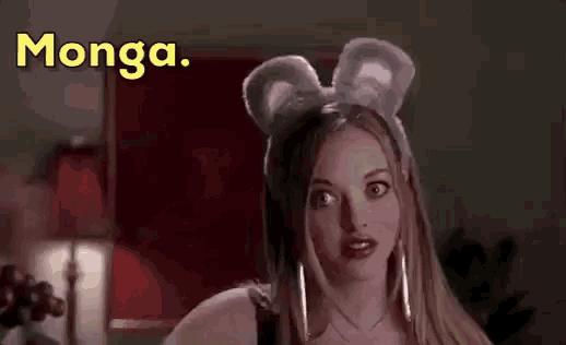 a woman is wearing bunny ears and the word monga is behind her