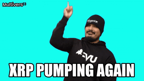 a man wearing a black hoodie that says xrp pumping again on it