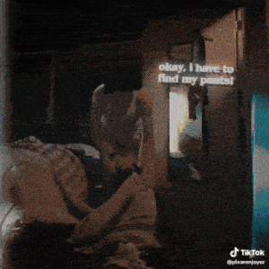 a blurred image of a person with a tiktok watermark