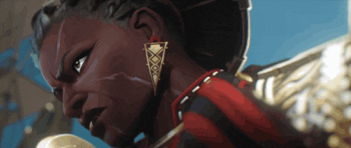 a close up of a woman 's face with a gold triangle earring
