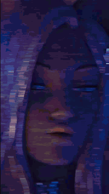 a blurry image of a person 's face with the letter e visible