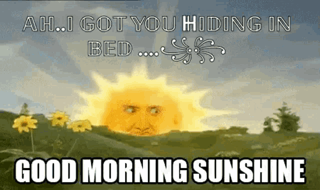 a picture of a sun with a face on it and the words " ah i got you hiding in bed good morning sunshine "
