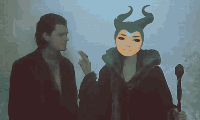 a man and a woman standing next to each other