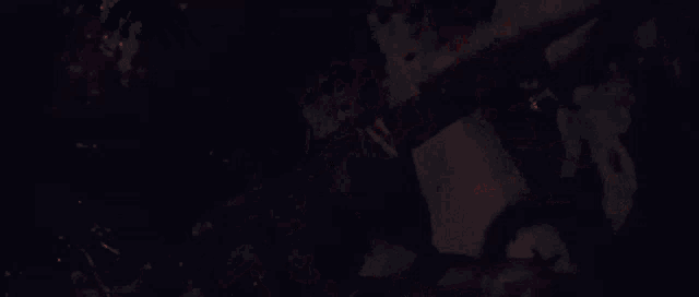 a large fire is burning in the dark with a lot of flames