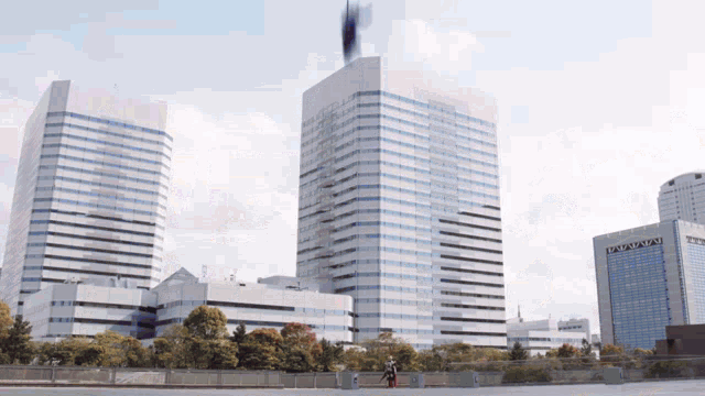 a large building with the word tokyo on the side