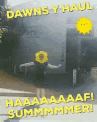 a woman wearing a yellow flower hat stands in front of a dawns y haul