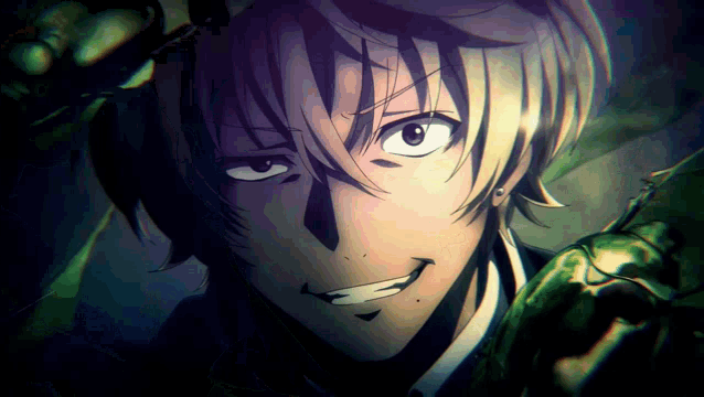 a close up of a person 's face with a smile on his face