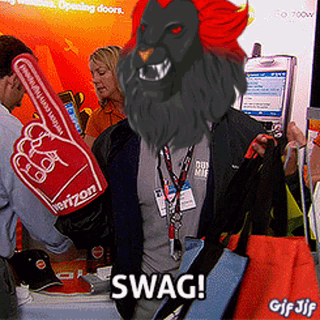 a man in a lion costume is holding a verizon glove