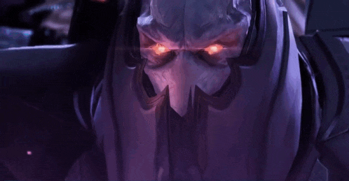 a close up of a video game character with red eyes and a hood .