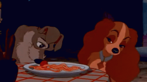 A GIF - Lady And The Tramp Share Food GIFs