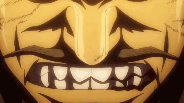 a close up of a cartoon character 's mouth with teeth showing