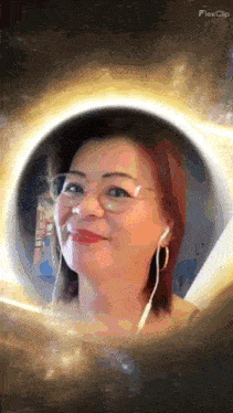 a woman wearing glasses and ear buds is surrounded by a black hole .