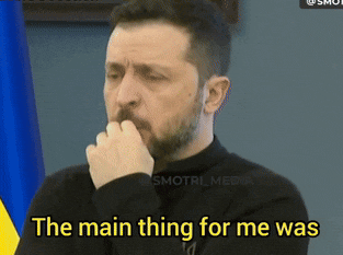 a man with a beard holds his hand to his mouth and says " the main thing for me was "