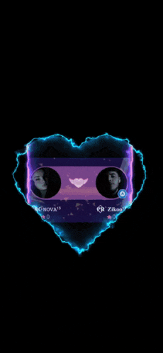 a heart shaped object with a reflection of a person inside