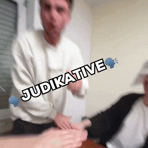 a blurry picture of a man with the words " judikative " on the bottom