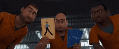 a group of men are holding up a picture of a troll