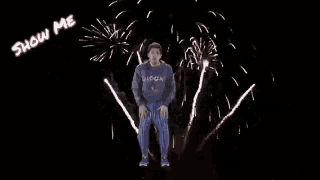a man in a purple shirt is jumping in the air with fireworks behind him and the word skin is written in pink