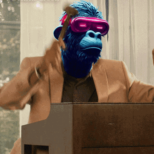 a man in a suit with a blue monkey on his face playing a piano