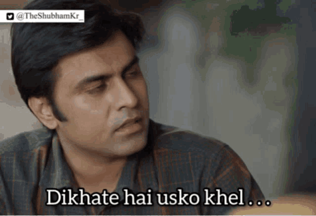 a man in a plaid shirt says " dikhate hai usko khel "