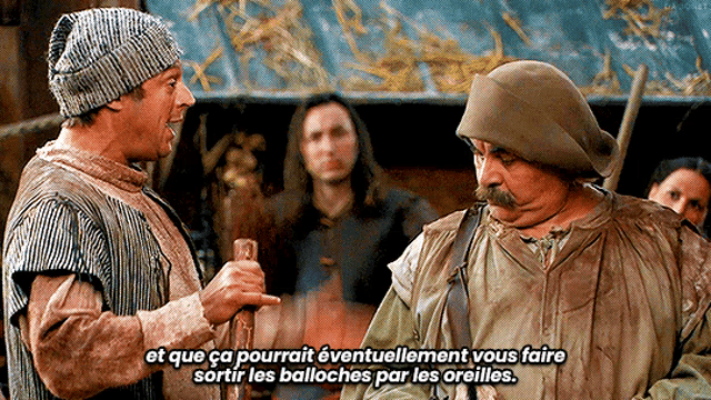 a man with a mustache is talking to another man in a foreign language ..