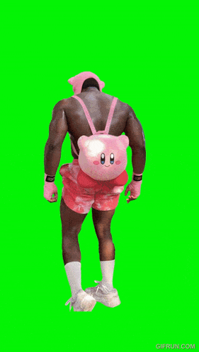a man in pink shorts and a pink hat flexes his muscles