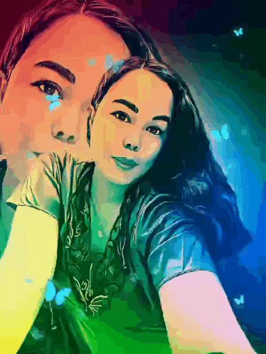 a colorful painting of a woman 's face with butterflies in the background