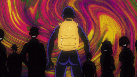 a man with a yellow backpack is standing in front of a crowd of people
