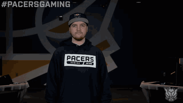 a man wearing a pacers gaming hoodie