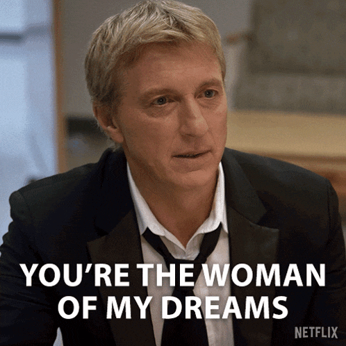 a man in a tuxedo and tie says you 're the woman of my dreams