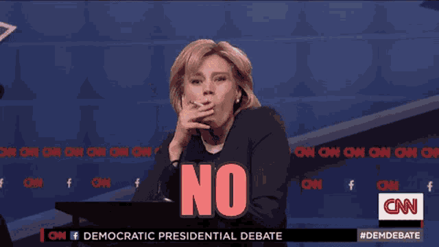 a woman smoking a cigarette in front of a screen that says no