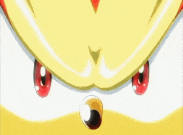 shadow the hedgehog from sonic the hedgehog is holding his fist up in a fist .