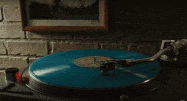 a record player with a record labeled midnights on it