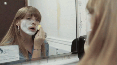 Applying A Mask Courtney Marie Andrews GIF - Applying A Mask Courtney Marie Andrews Courtney Marie Andrews Channel GIFs