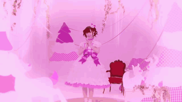 a girl in a white dress with a purple bow around her waist