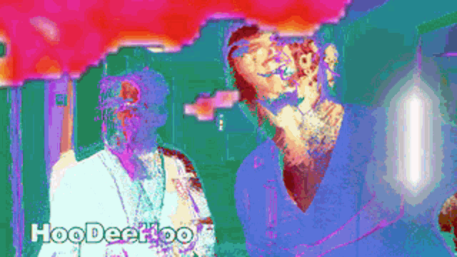 a blurry picture of a man standing in front of a purple and green background .