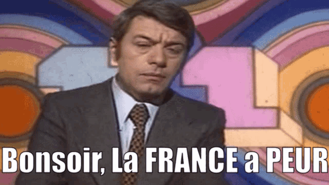 a man in a suit and tie with the words bonsoir la france a peur