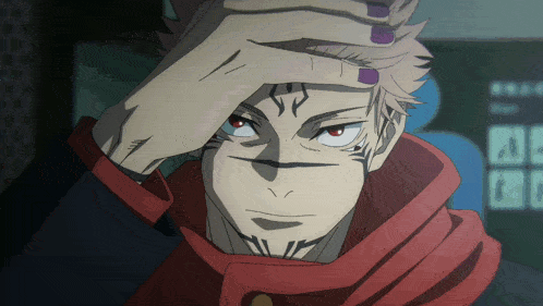 a close up of a person 's face with a red scarf around their neck
