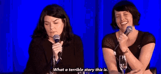 two women are sitting at a table with microphones and one of them is saying what a terrible story this is .