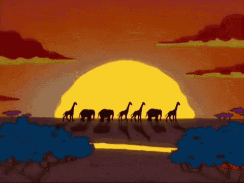 a group of giraffes and elephants are walking in front of a large sun